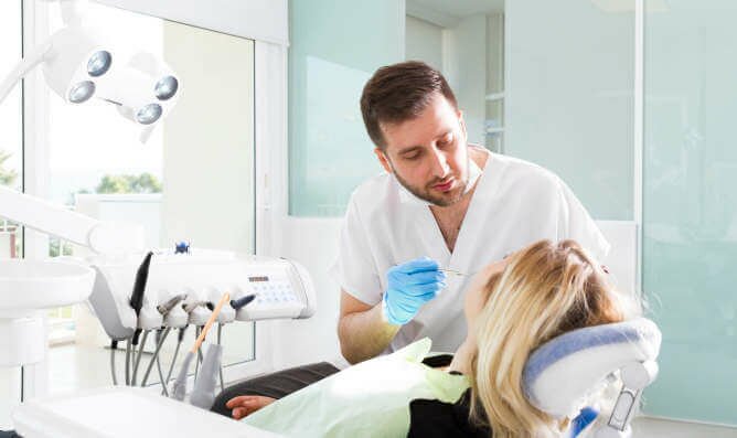 patient receiving dental work at Dallas dental office Glow Dental
