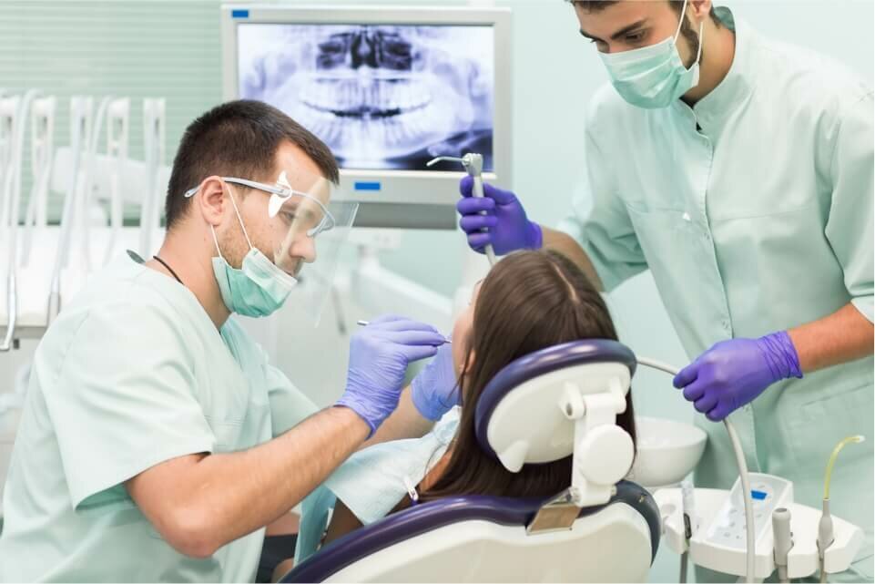 patient with dentist in dallas, tx